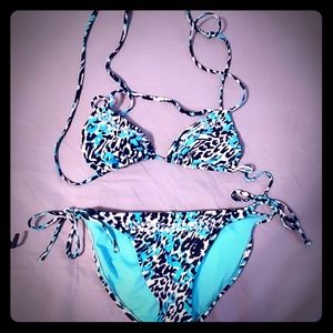 Teal, black, and white cheetah bikini